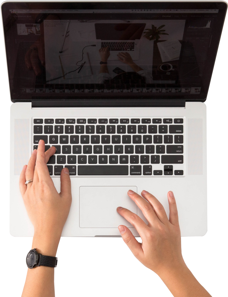 female hands typing on a laptop keyboard